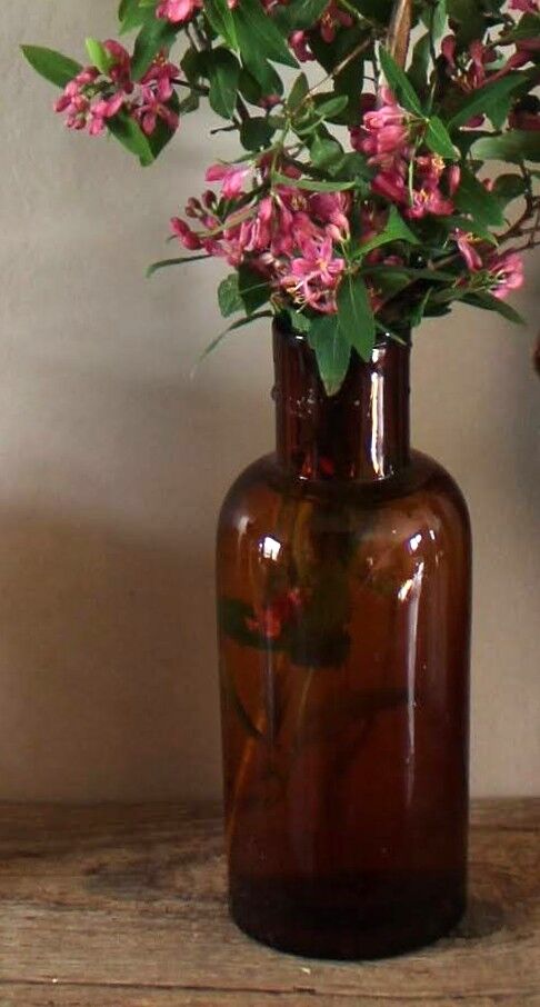 Vase flacon en verre ambré