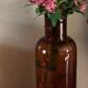 Vase flacon en verre ambré