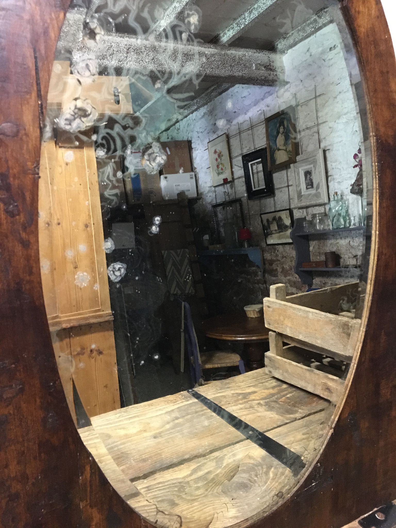 Bevelled oval mirror 92x63