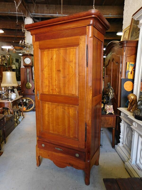 Bonnetiere in cherry 1 door 1 drawer of the xix century