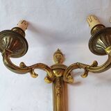 Pair of bronze wall sconces in Louis XVI style