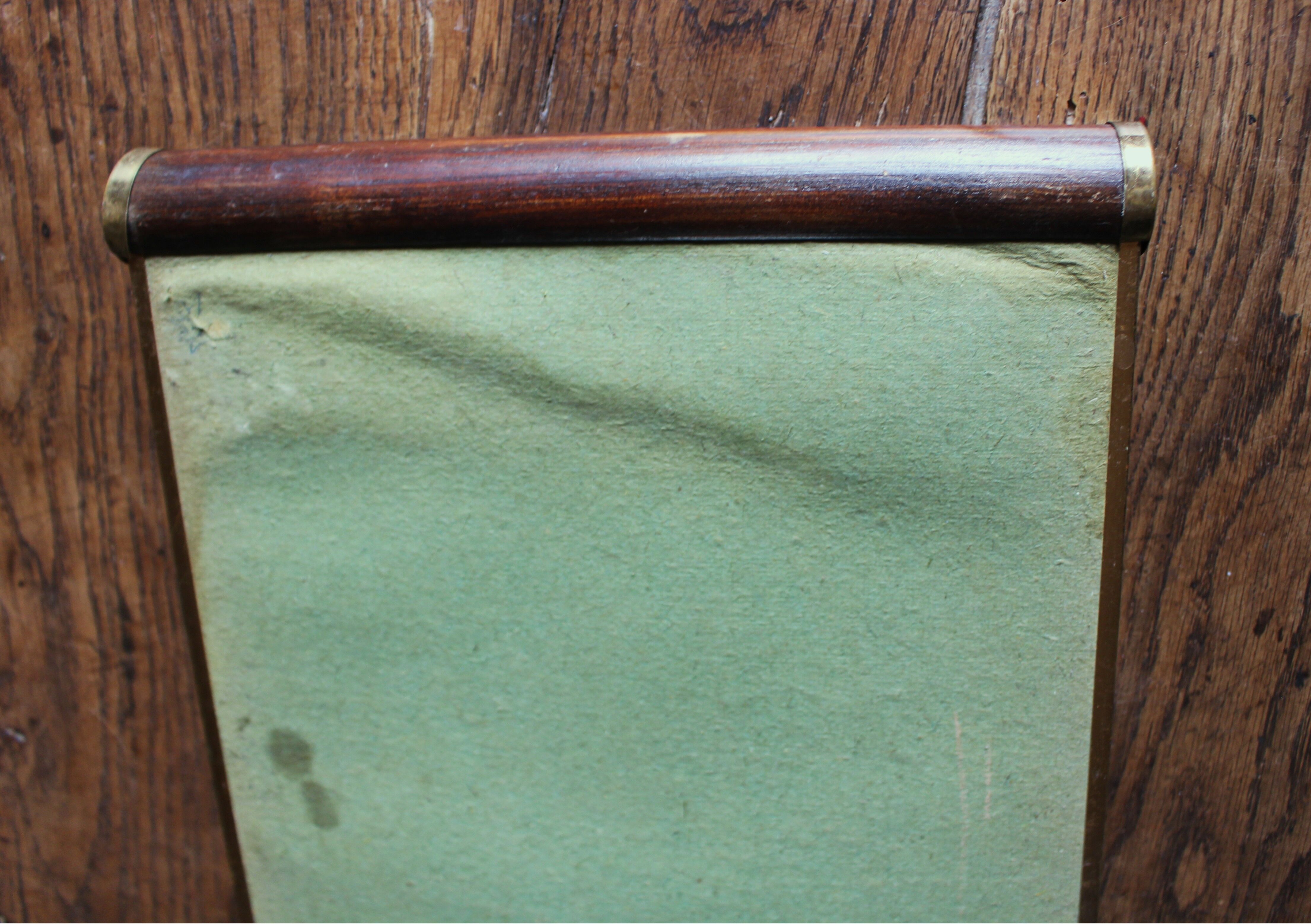 Rectangular mirror tray with wooden handles and gilding.