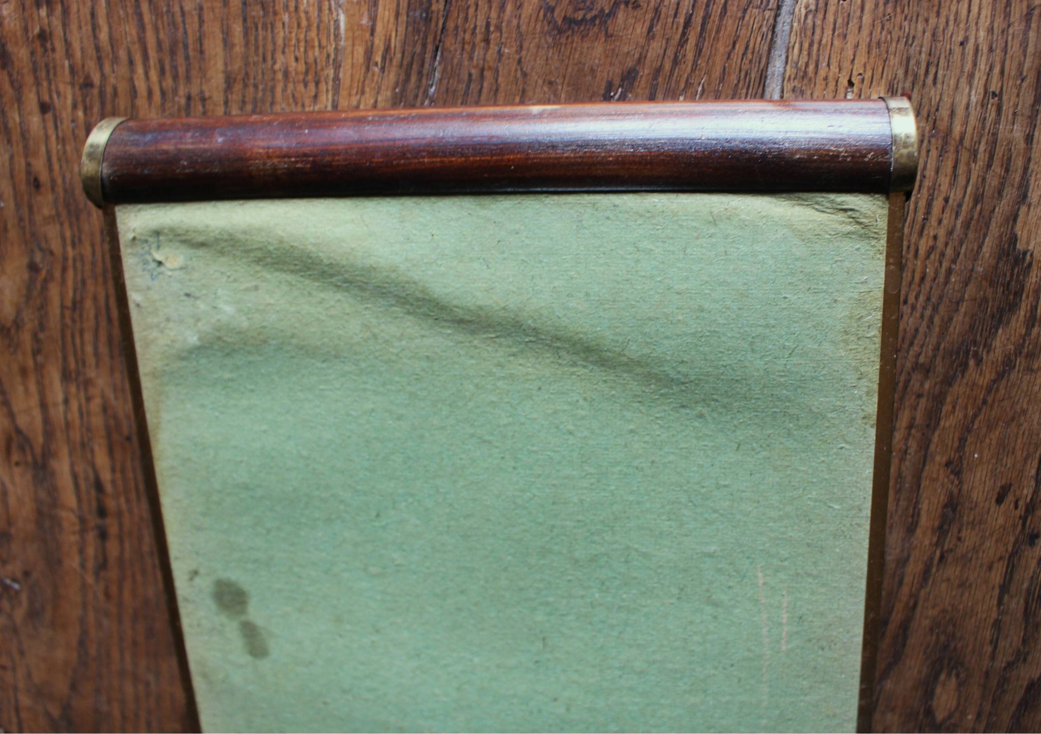 Rectangular mirror tray with wooden handles and gilding.