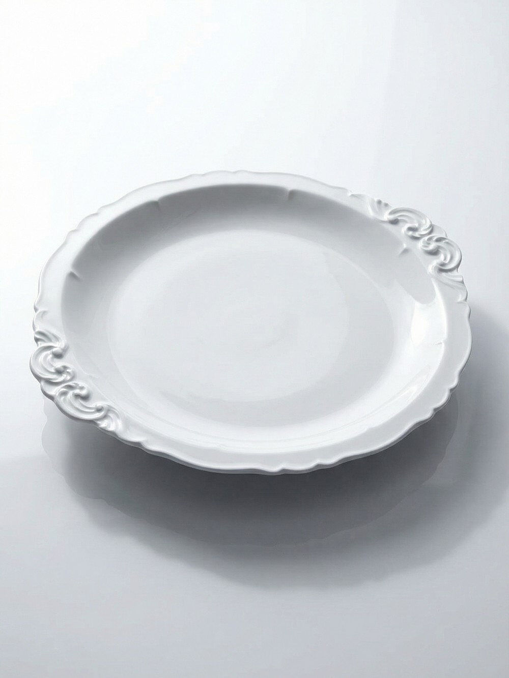 Large serving dish in fine white Limoges porcelain, vintage/antique.