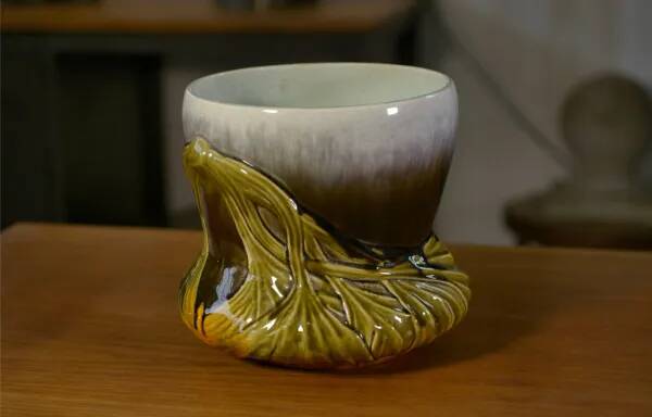 Numbered polychrome art nouveau ceramic planter, early 20th century