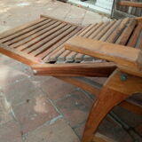 Teak stretchy long chair.