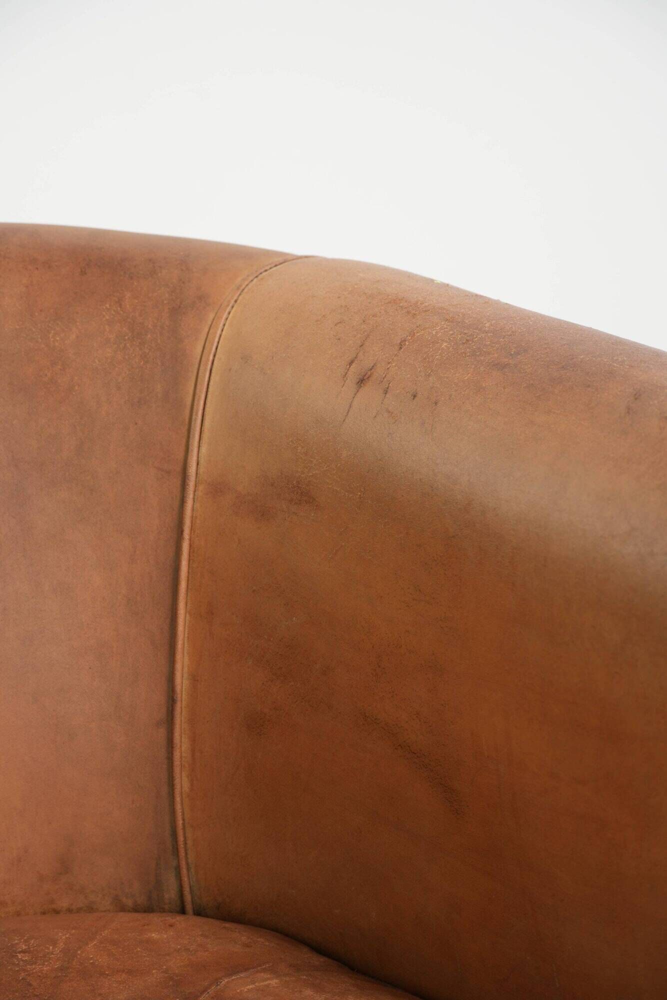 Vintage sheepskin club armchair in a beautiful light cognac colour