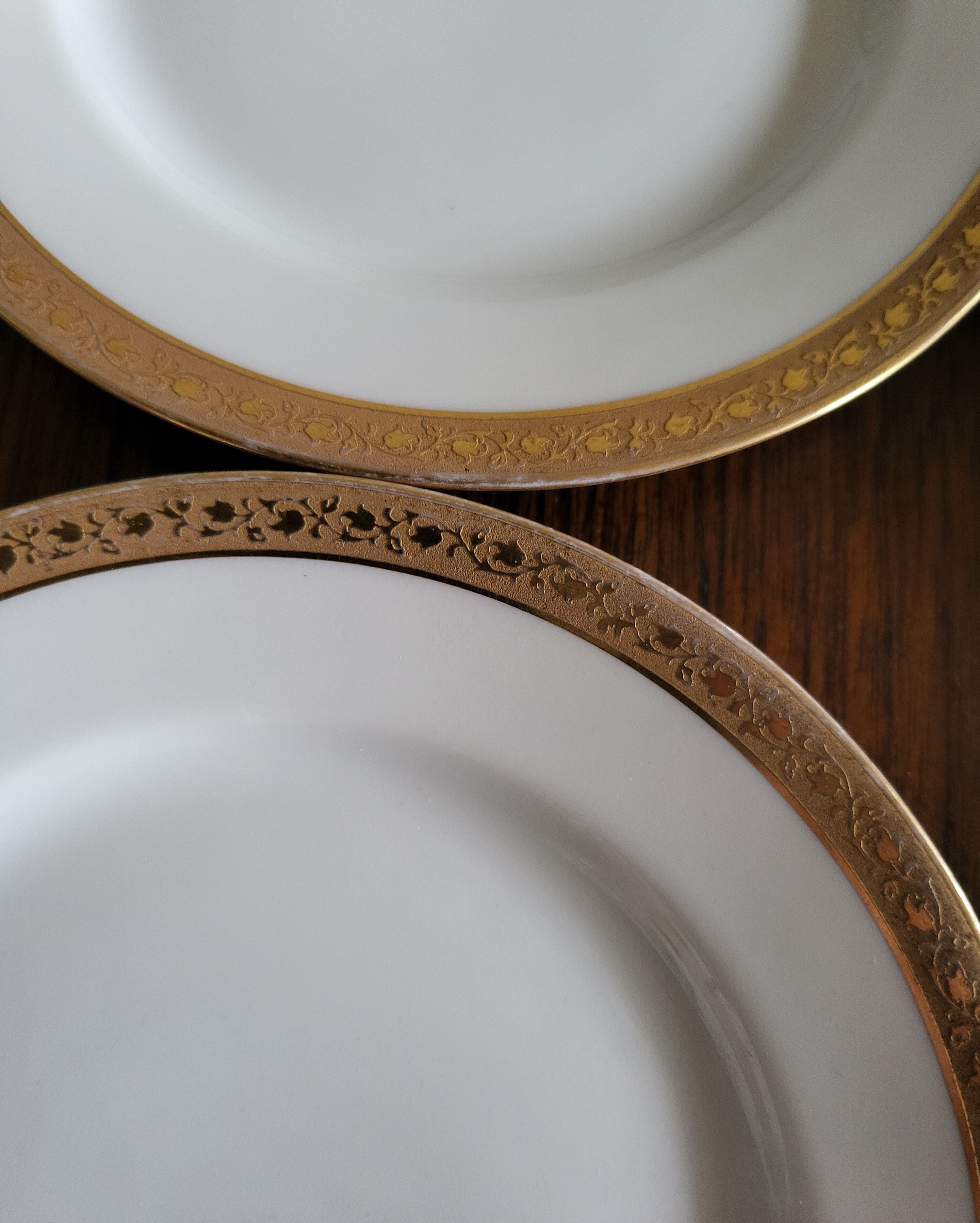 Lot of 8 small porcelain bread plates.