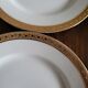Lot of 8 small porcelain bread plates.