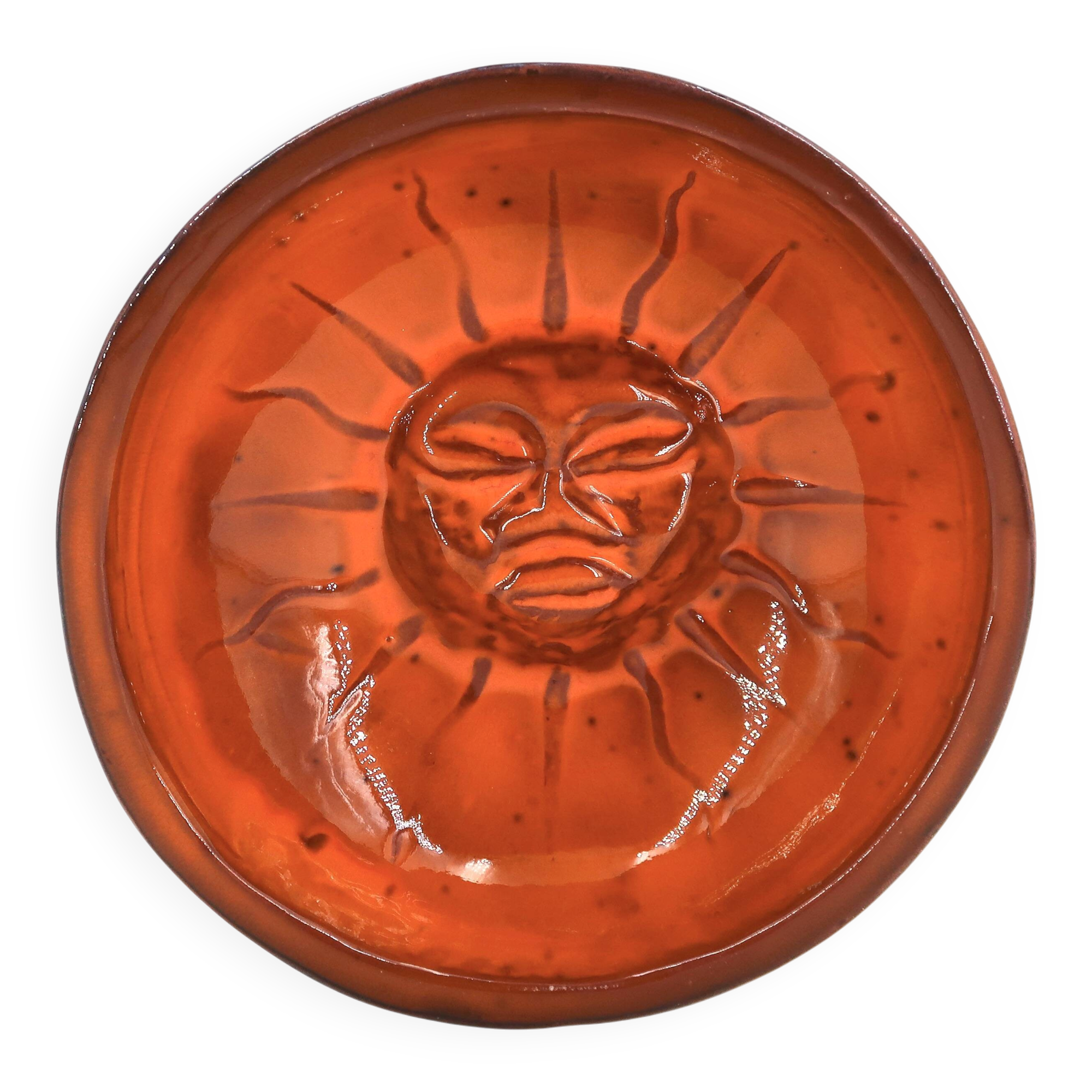 Mexican ceramic catchall in orange and black, 1970s sun face.