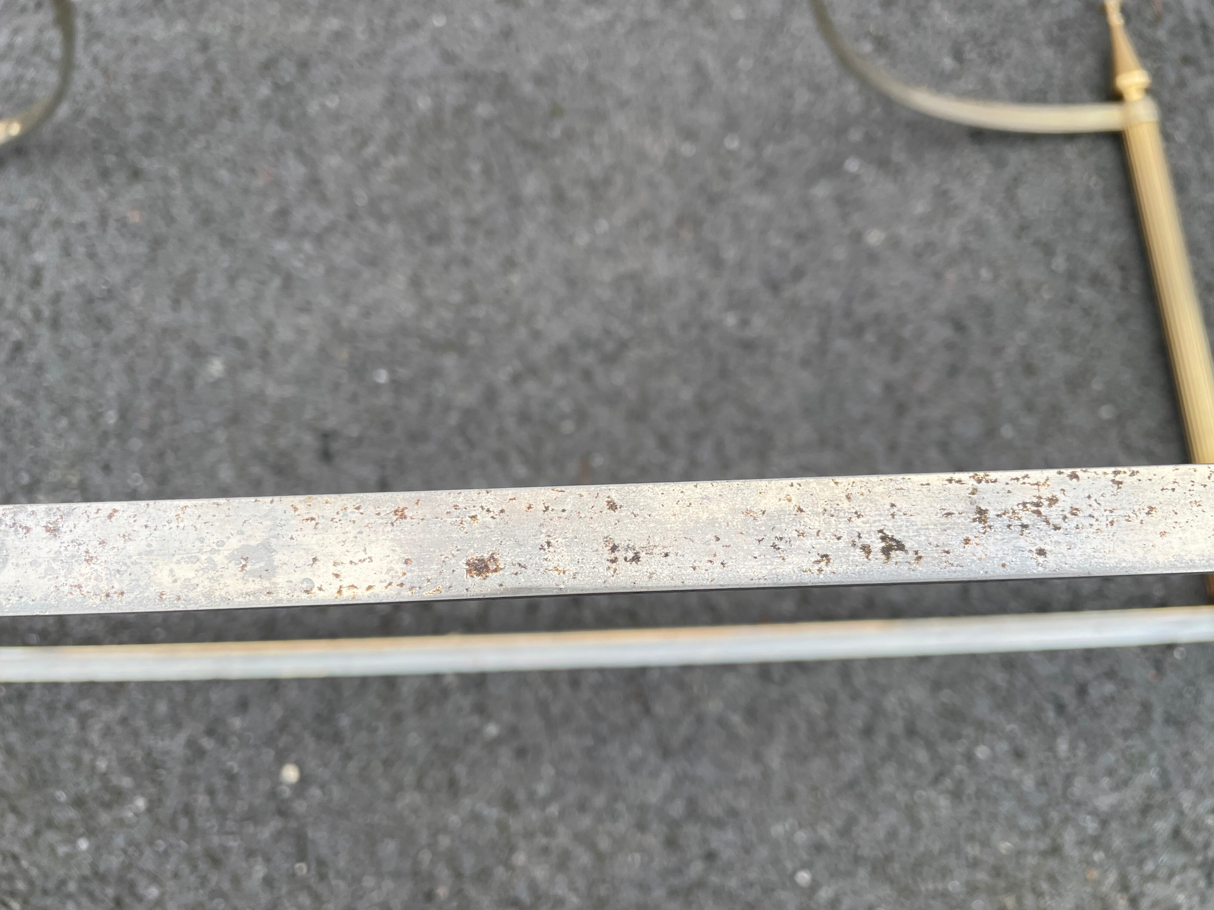 Coffee table in gilded brass and veined green marble