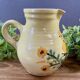 Earthenware pitcher from Savoy with bird decoration.