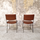 Paire de chaises skaï et chrome