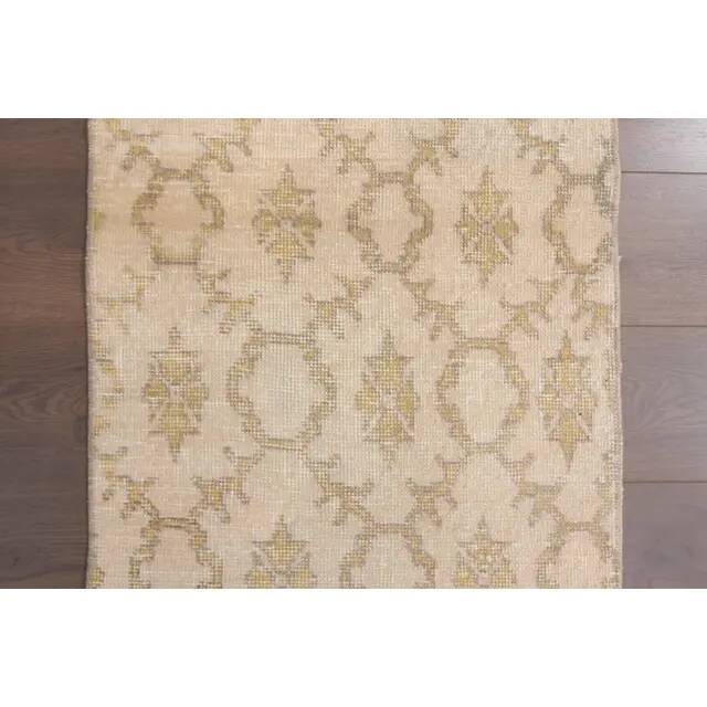 1970s vintage Turkish hand-knotted wool cotton beige runner rug 62x261