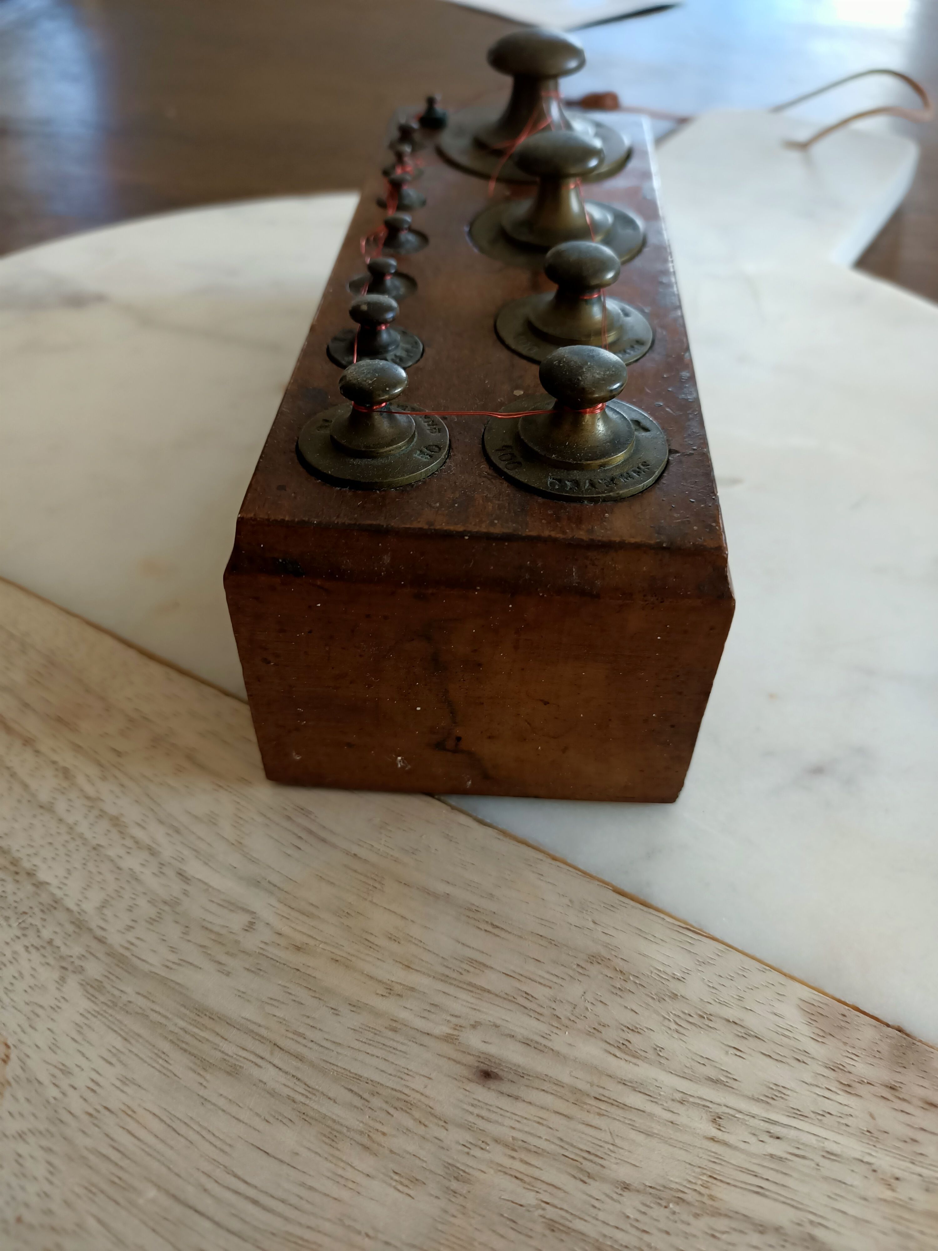 Box with old brass weight