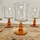 6 small amber stemmed glasses