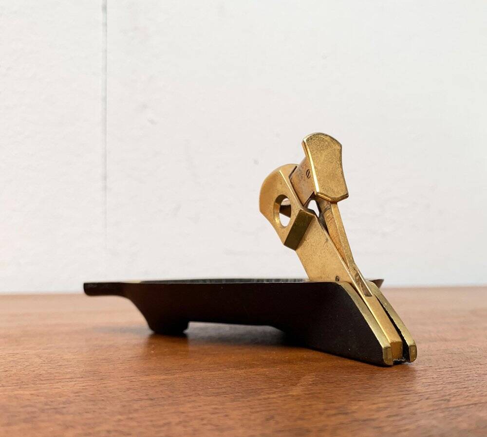 German brass ashtray with cigar cutter, 1950s.