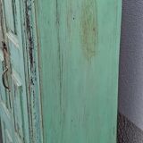 Old wooden cabinet with beautiful green patina