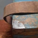 Old wooden trunk with blue patina