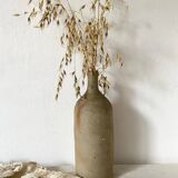 Old terracotta bottle