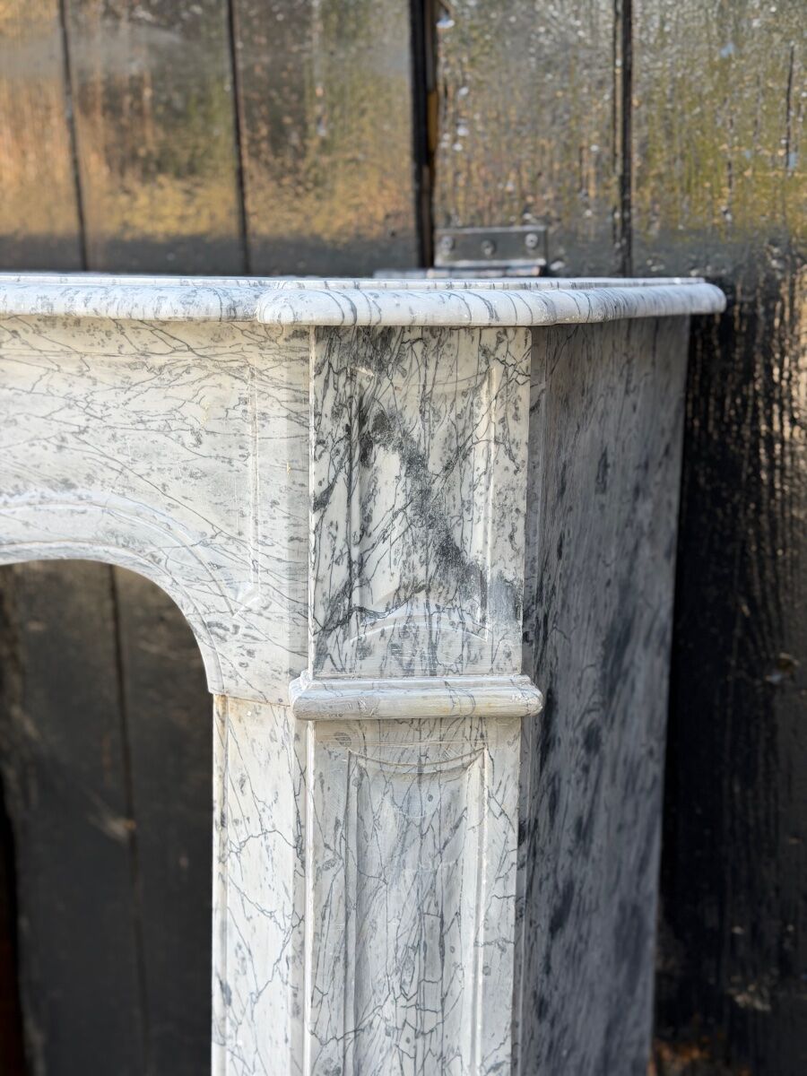 Pompadour model fireplace in blue Turquin marble from around 1880, one pair available.