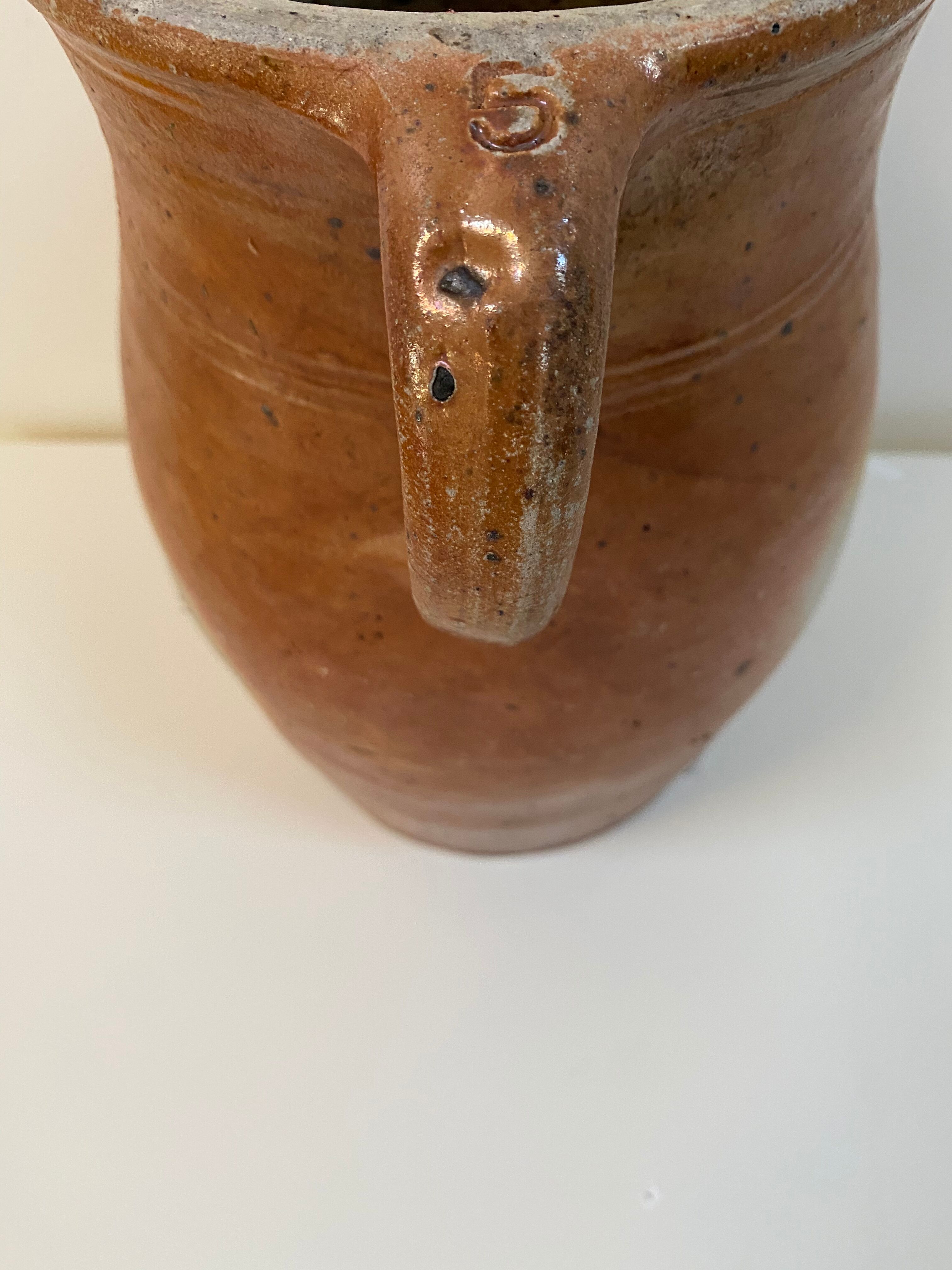 Old sandstone pitcher pot
