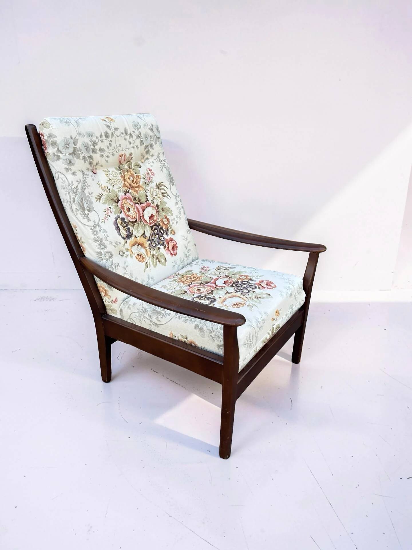 Vintage teak armchair with floral upholstery