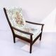 Vintage teak armchair with floral upholstery