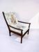 Vintage teak armchair with floral upholstery