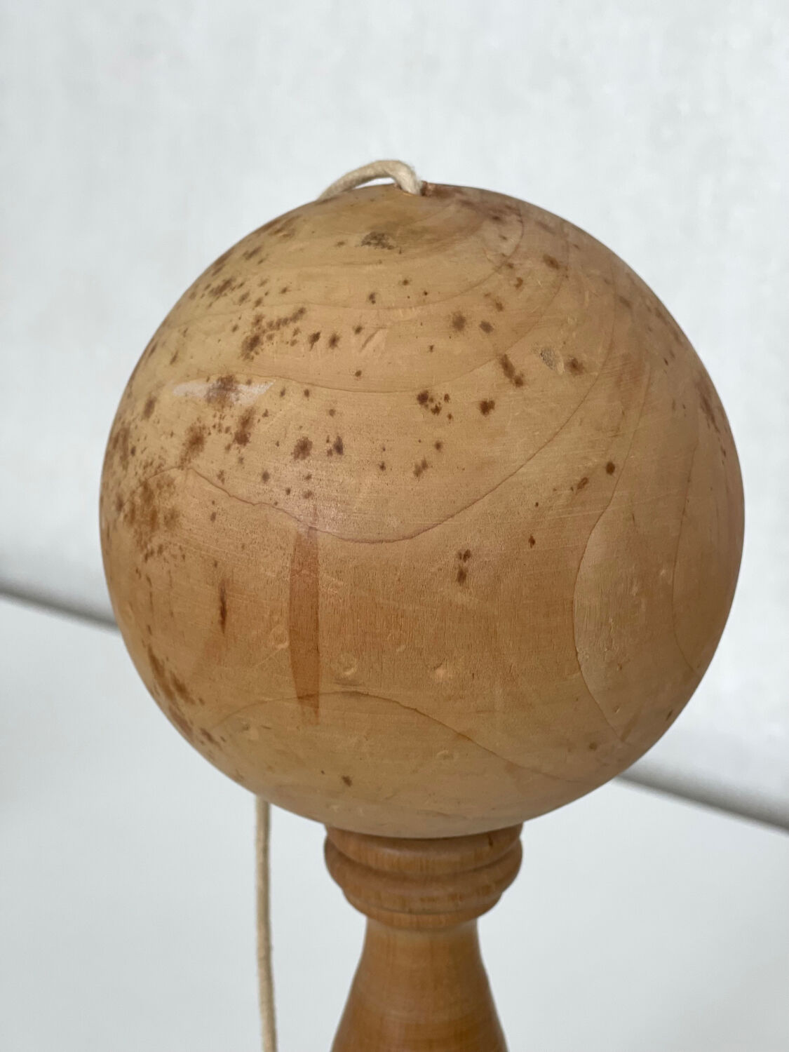 Old wooden bilboquet