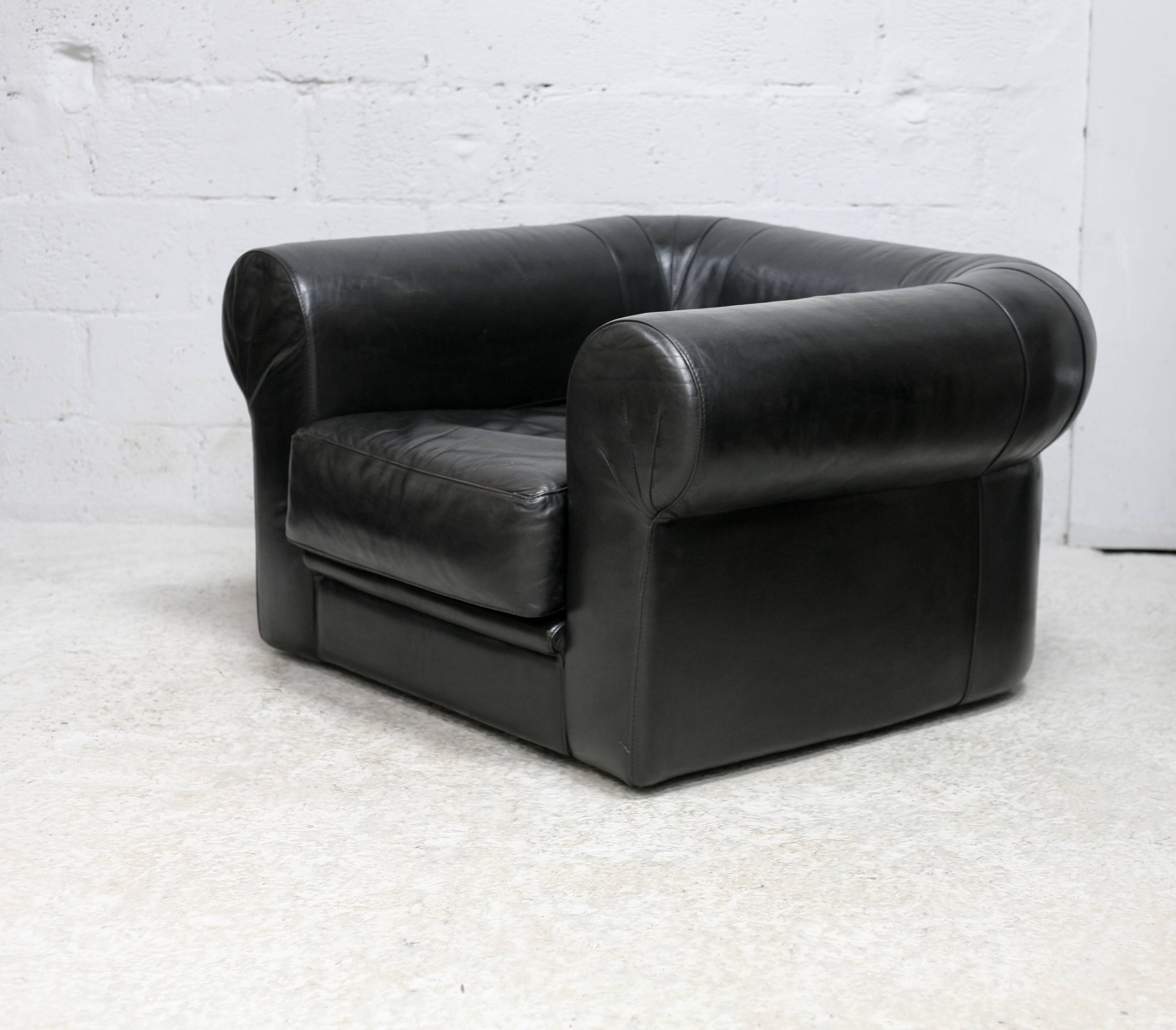 Large black leather armchair, France, 1980s