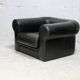 Large black leather armchair, France, 1980s