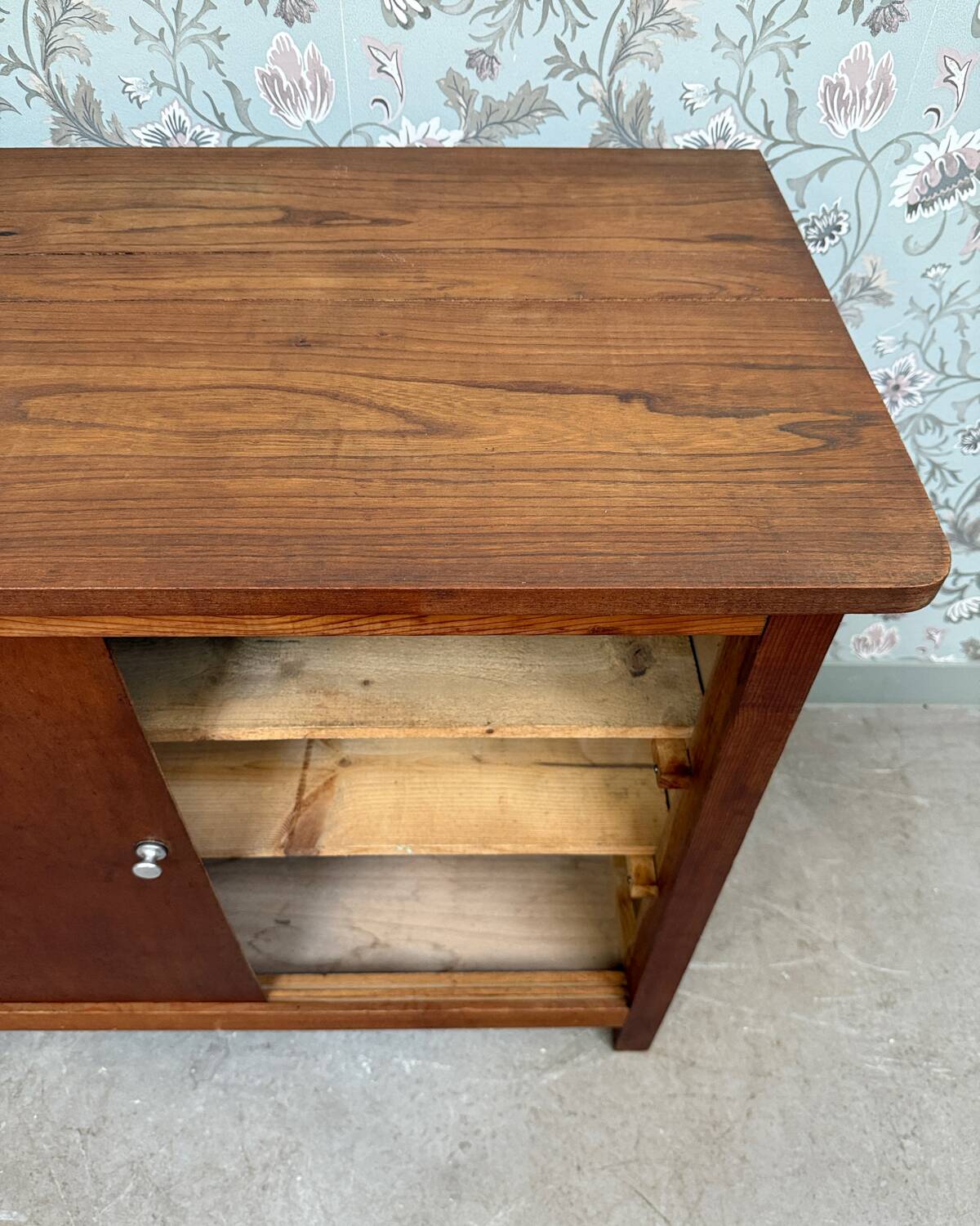 Vintage sideboard with sliding doors