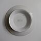 Old round footed plate signed Labrut brothers flowers