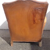 Mustache leather club chair