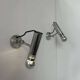 Pair of vintage adjustable wall lights, chromed metal, France 1970