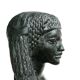 Woman bust in carved stone, 50s