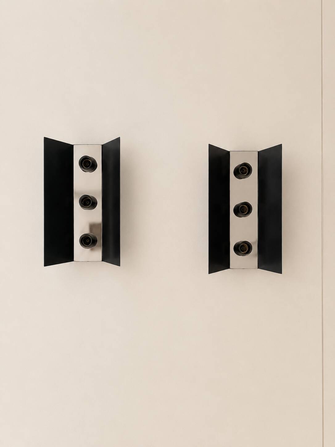 Pair of vintage wall sconces, black metal and chrome, France, 1970.