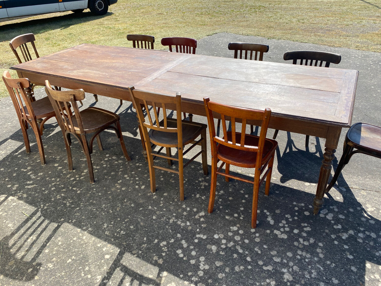 Draper table and its 10 chairs