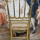 Napoleon III theatre chair in gilded wood