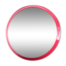 Vintage red round plastic mirror from the 1960s.