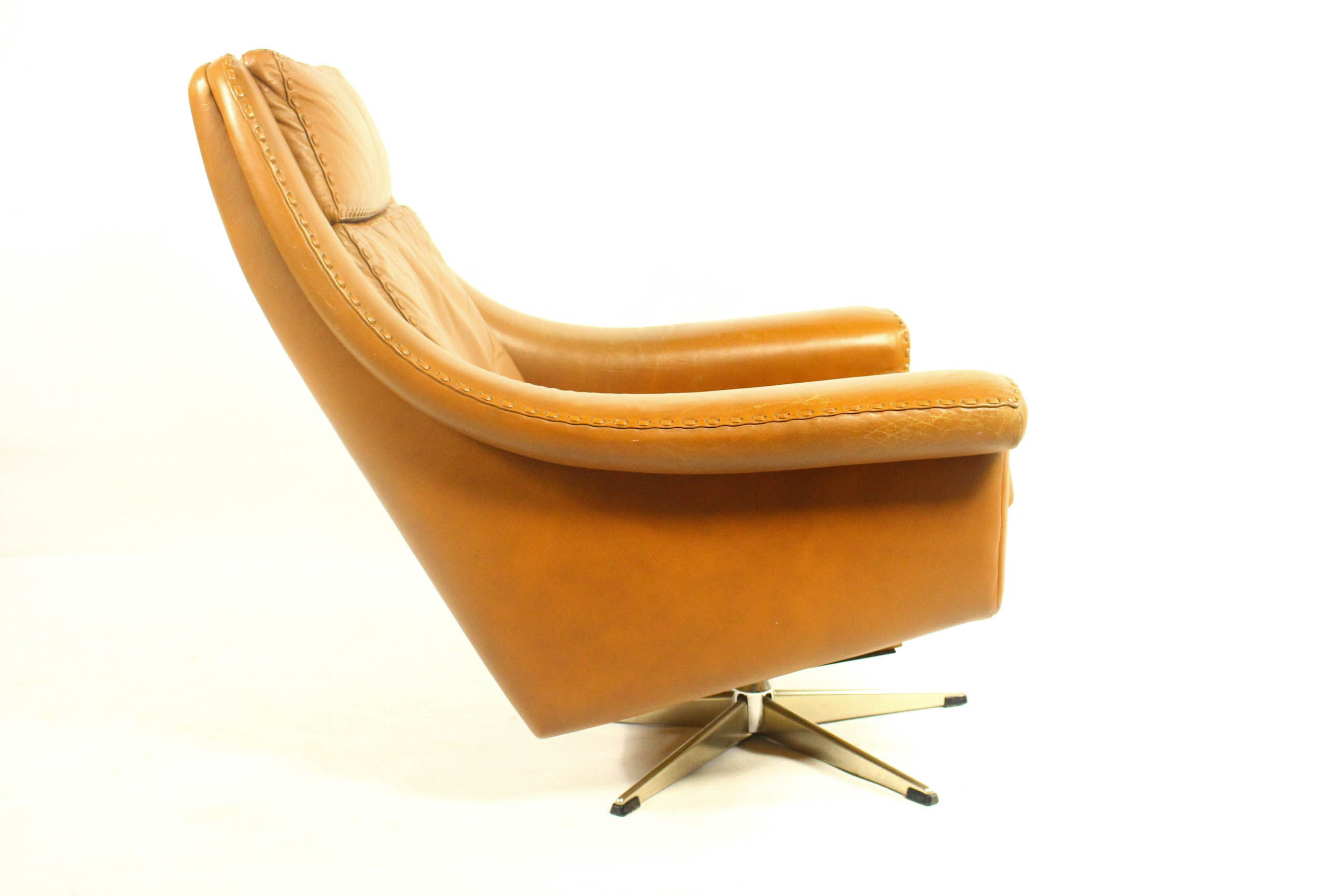 Matador swivel leather chair with ottoman by Aage Christiansen for Erhardsen & Andersen, 1960s
