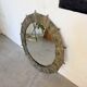 Brutalist round hammered gold metal mirror
