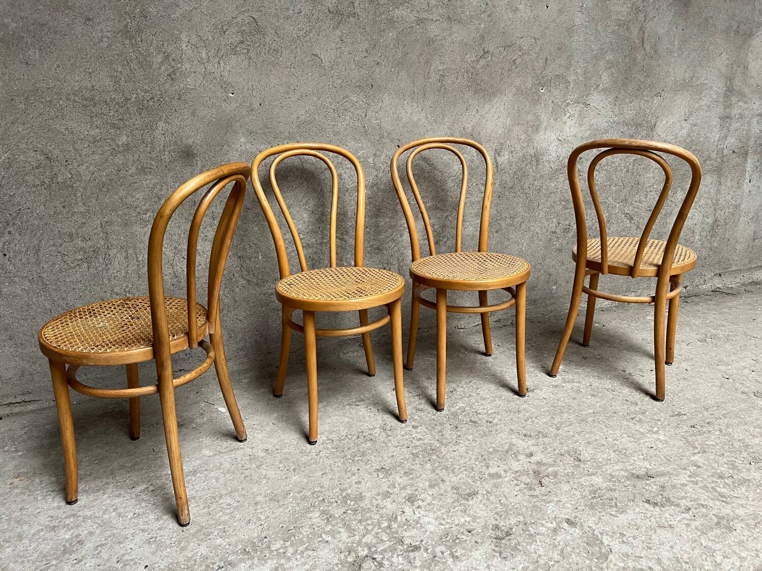 Set of 4 vintage bistro chairs in curved wood and cane seats 1950 1960