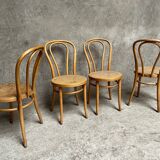 Set of 4 vintage bistro chairs in curved wood and cane seats 1950 1960