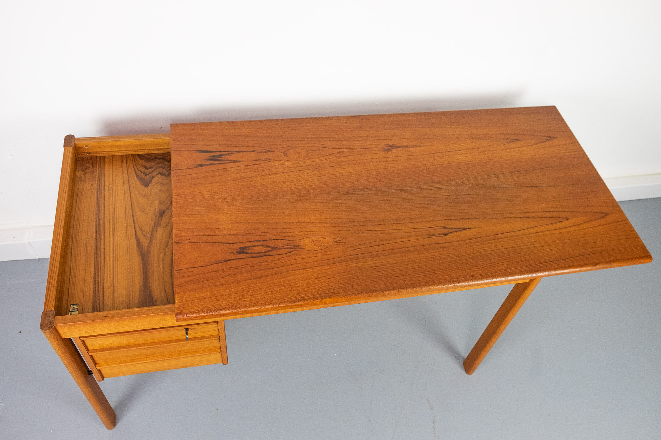Teak Desk with movable table top by Løvig, 1960s