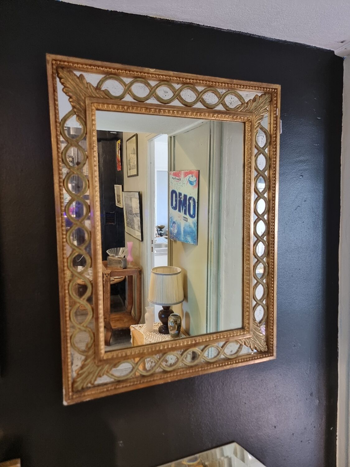 Mirror with parecloses