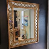 Mirror with parecloses