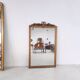 Miroir de cheminée en bois doré à décor de nœud et de roses H : 164 cm