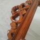 Wooden hanging mirror with vintage carved knot